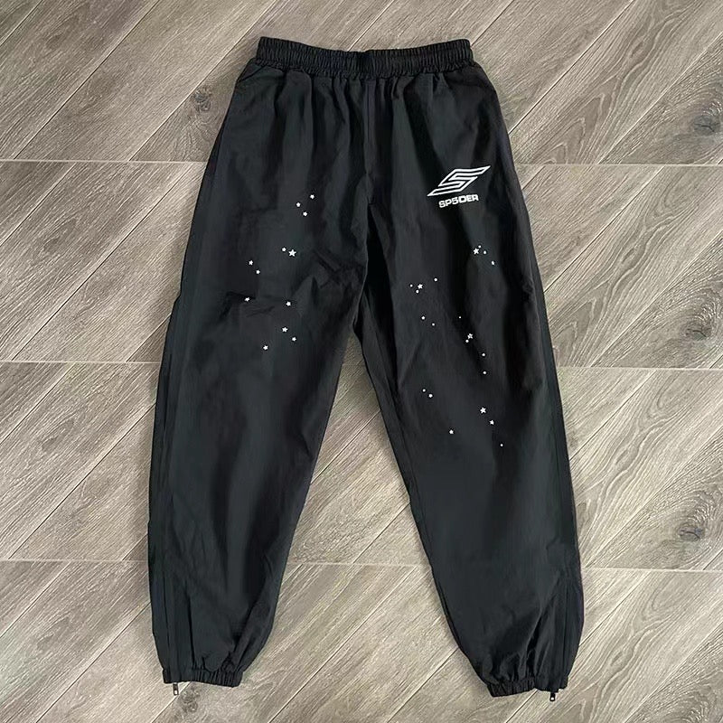 Schwarze und blaue Jacke mit Hose