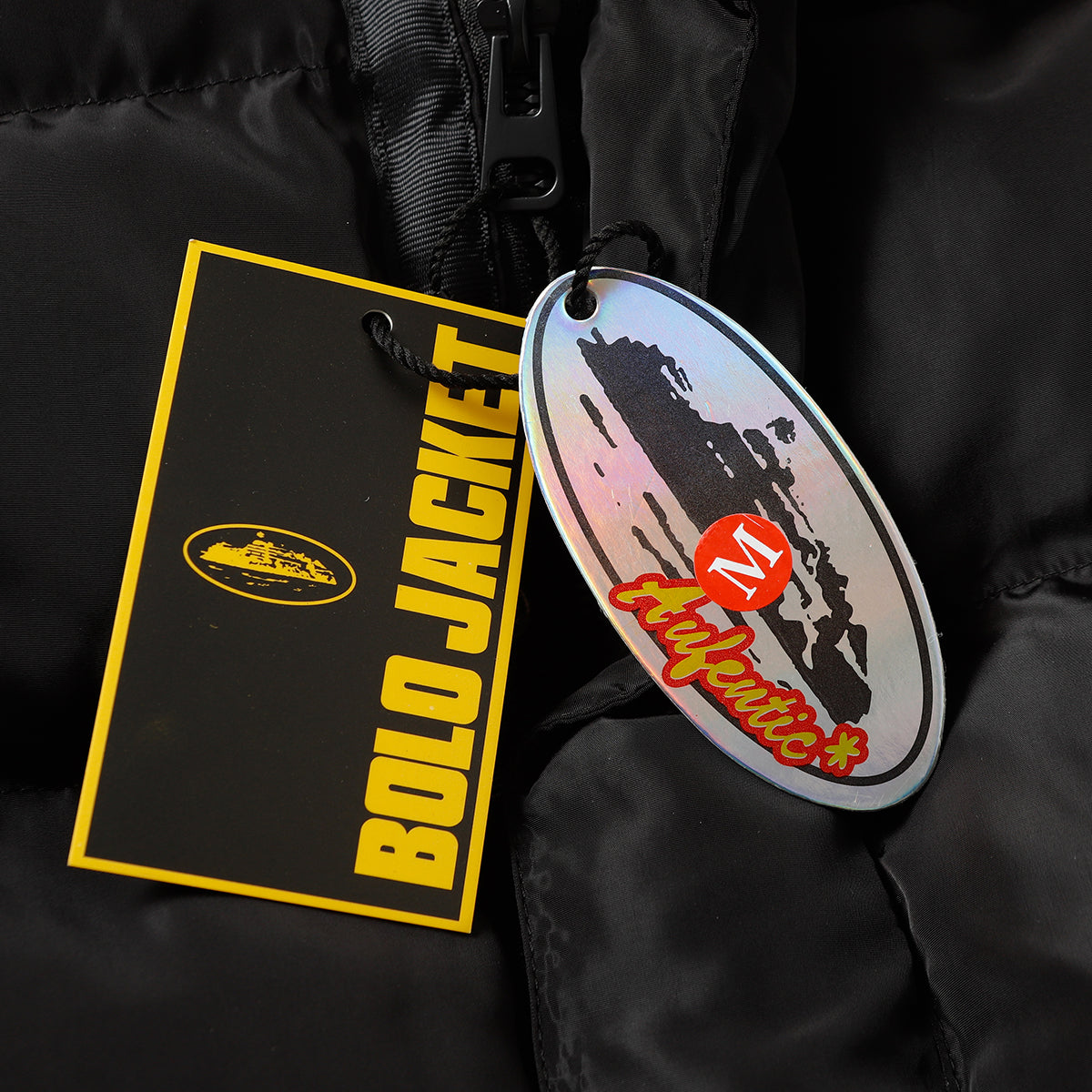 Schwarze und graue Jacke