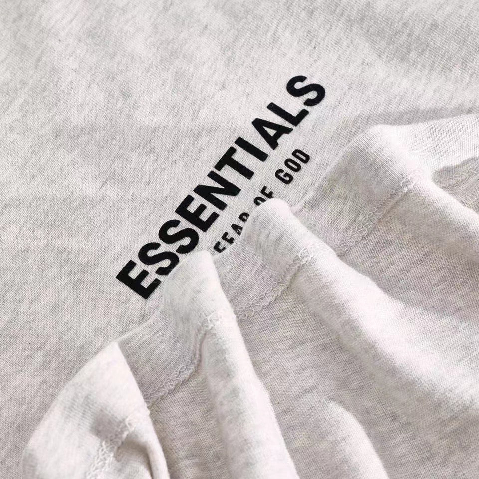 Camiseta gris claro, gris oscuro y negra