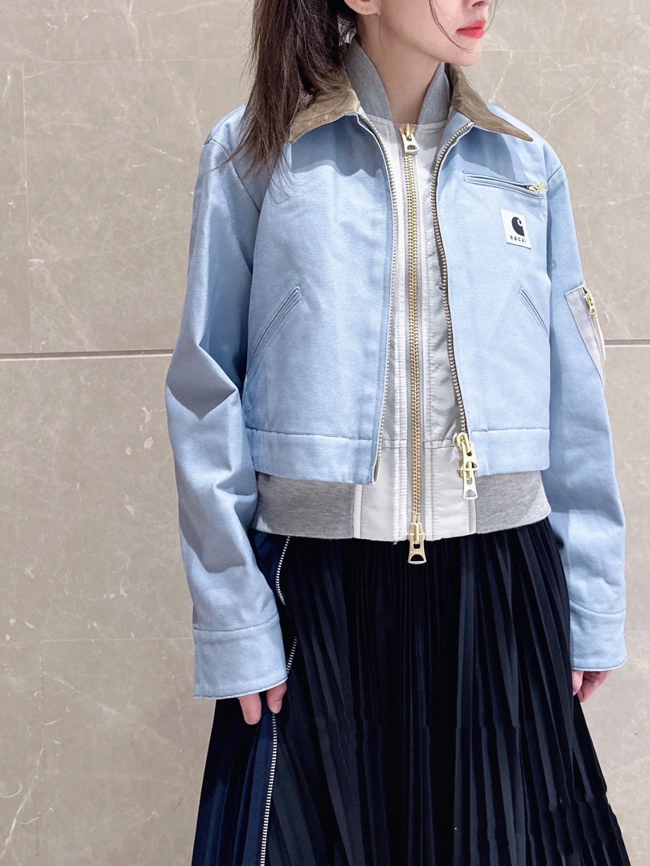 Jacke in Schwarz, Khaki und Hellblau