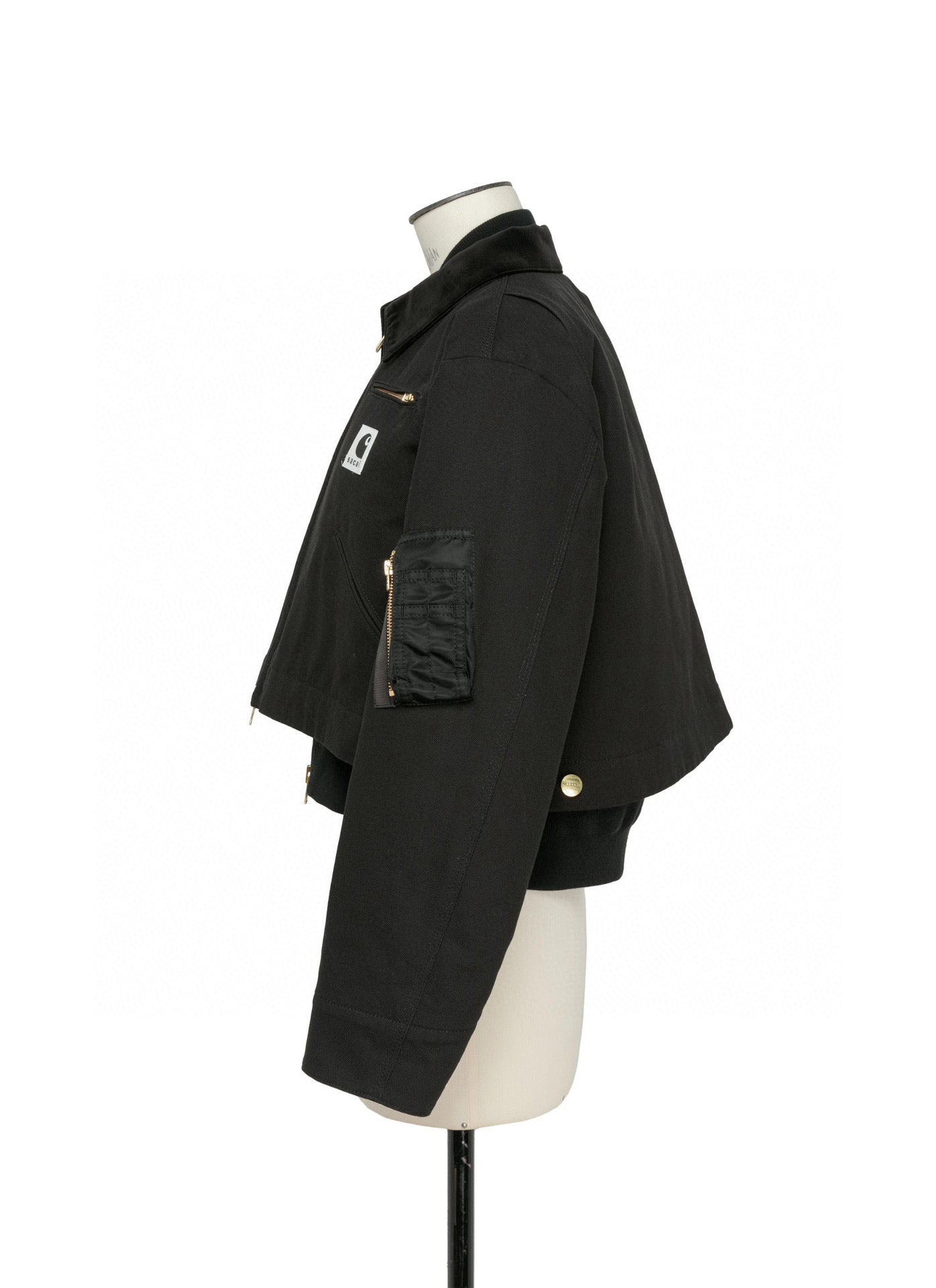 Jacke in Schwarz, Khaki und Hellblau
