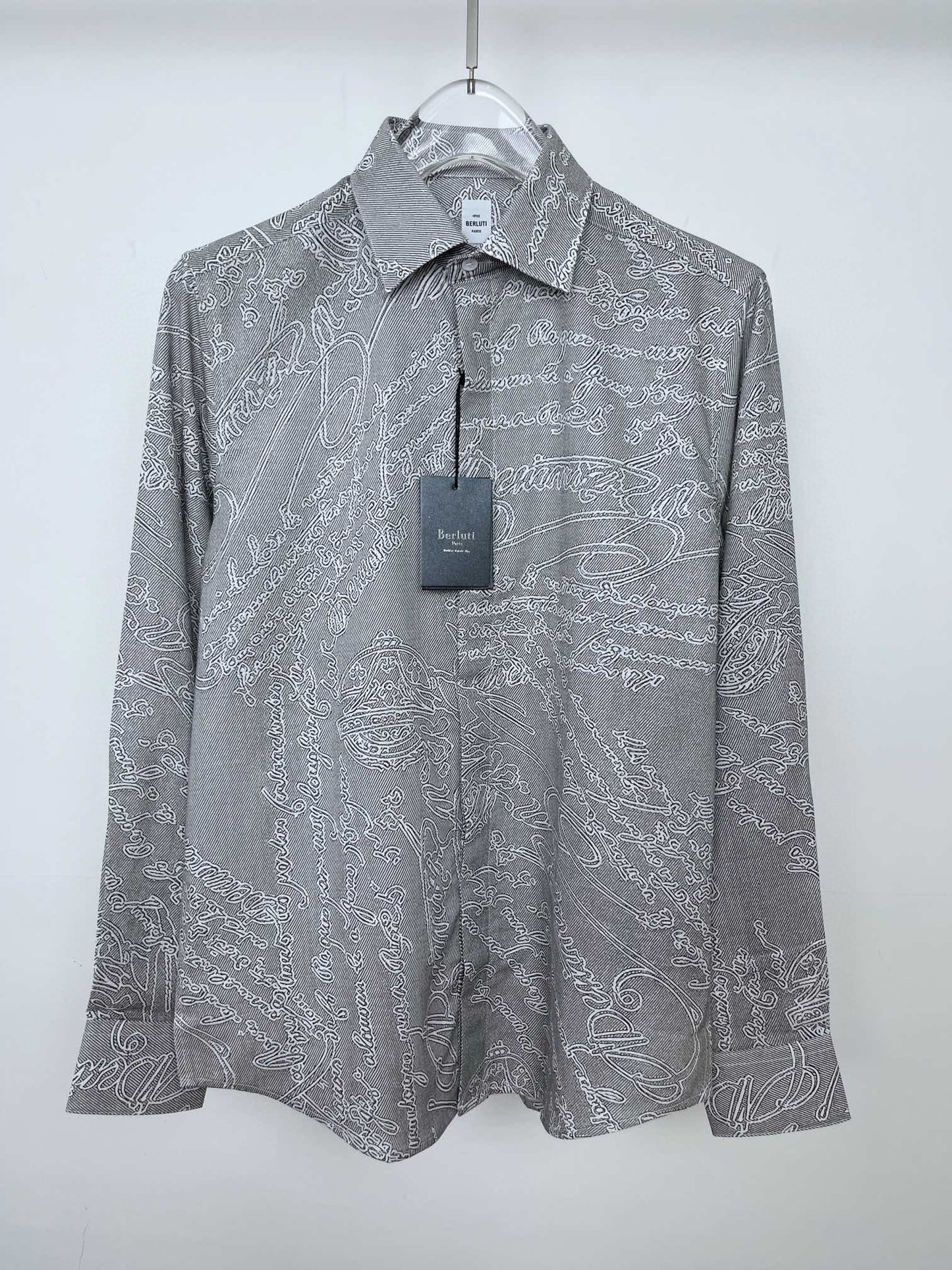 Camisa azul claro y gris