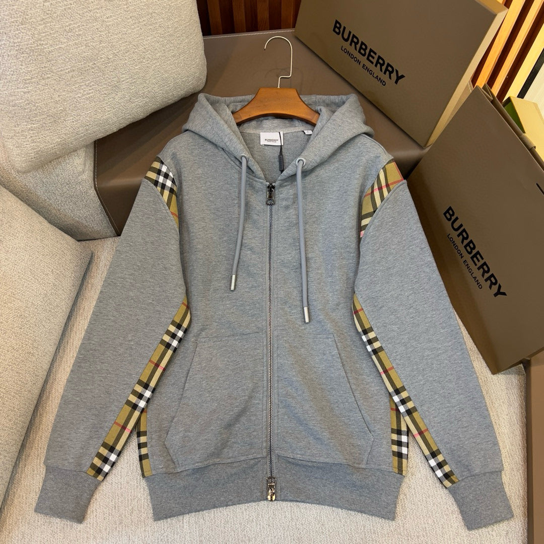 Schwarze und graue Jacke