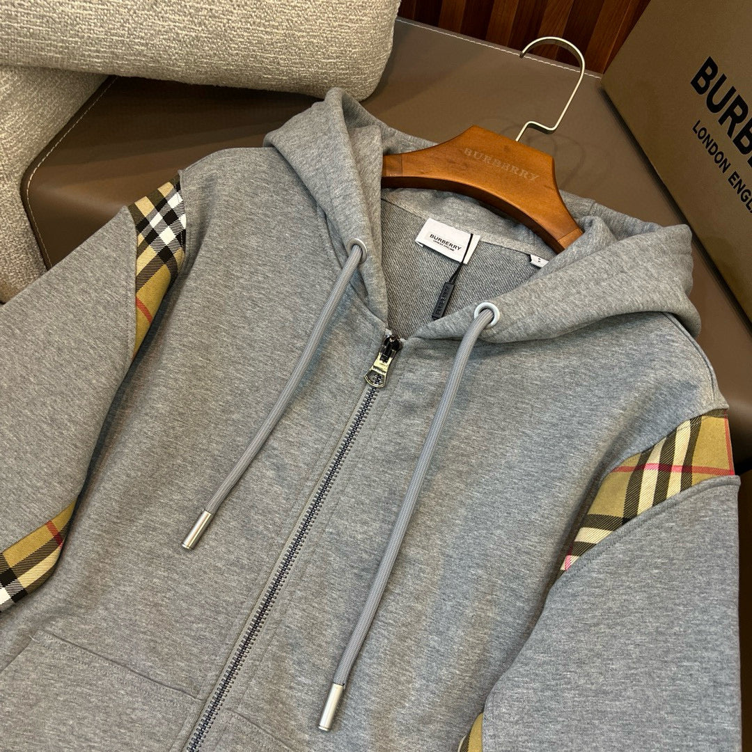 Schwarze und graue Jacke