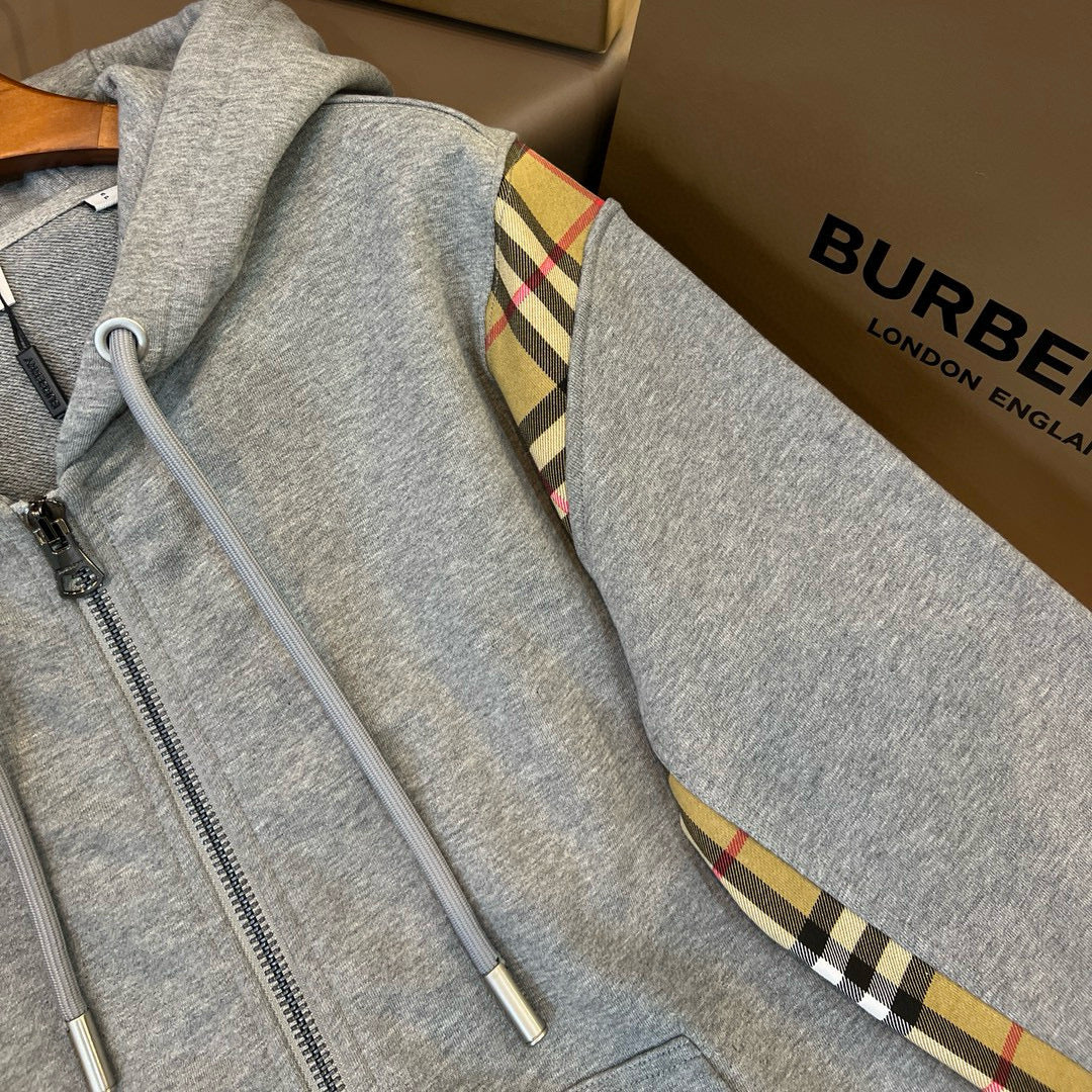 Schwarze und graue Jacke