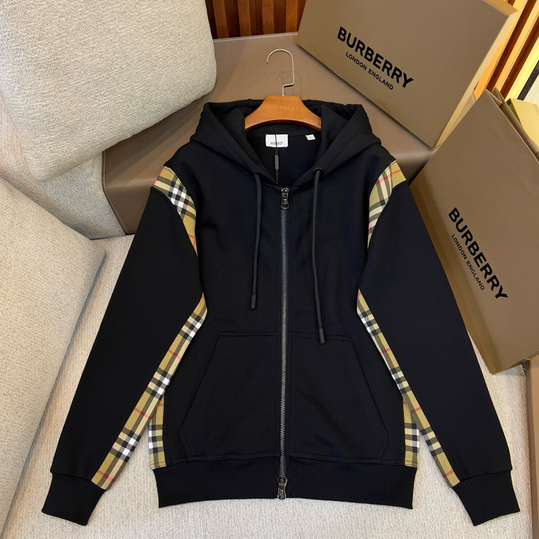 Schwarze und graue Jacke