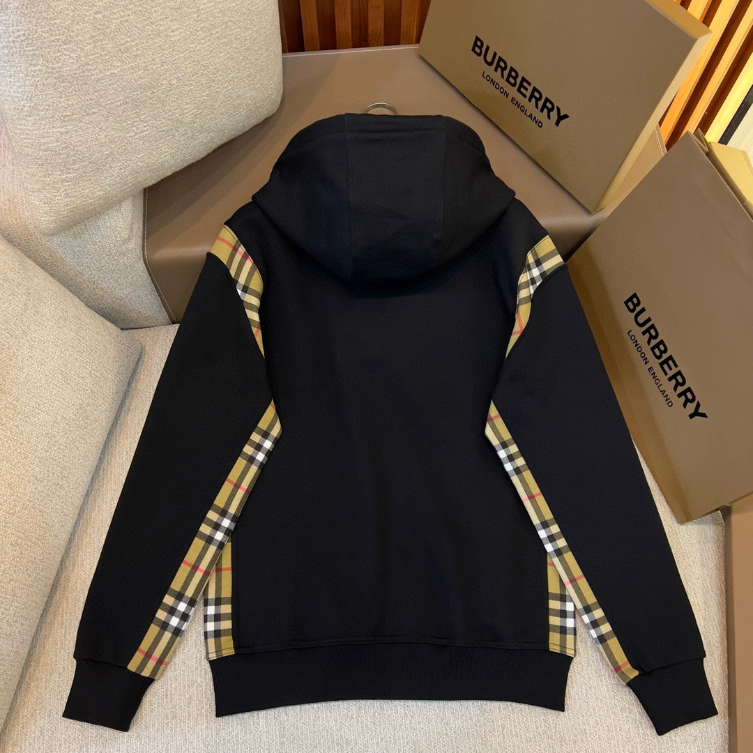Schwarze und graue Jacke