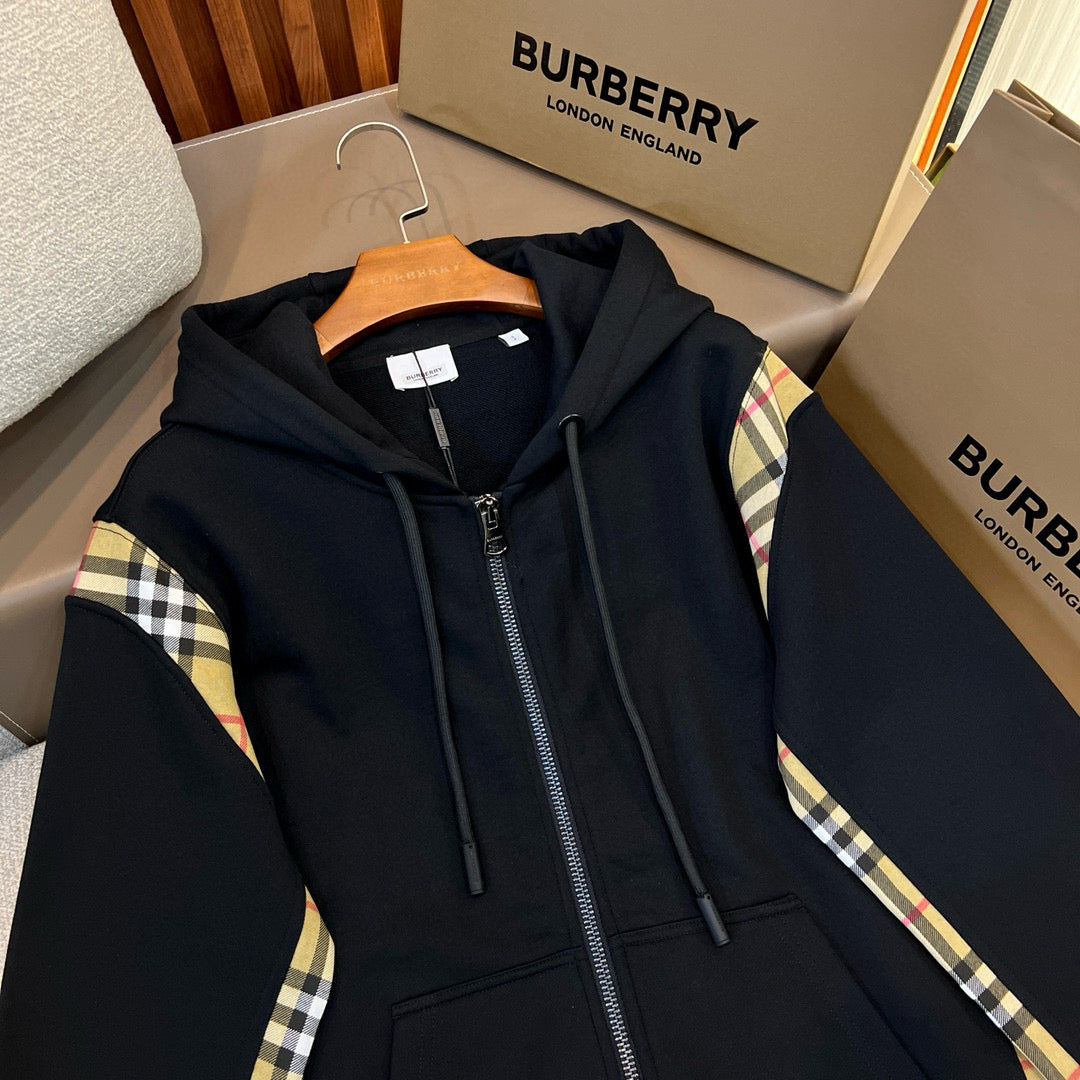 Schwarze und graue Jacke