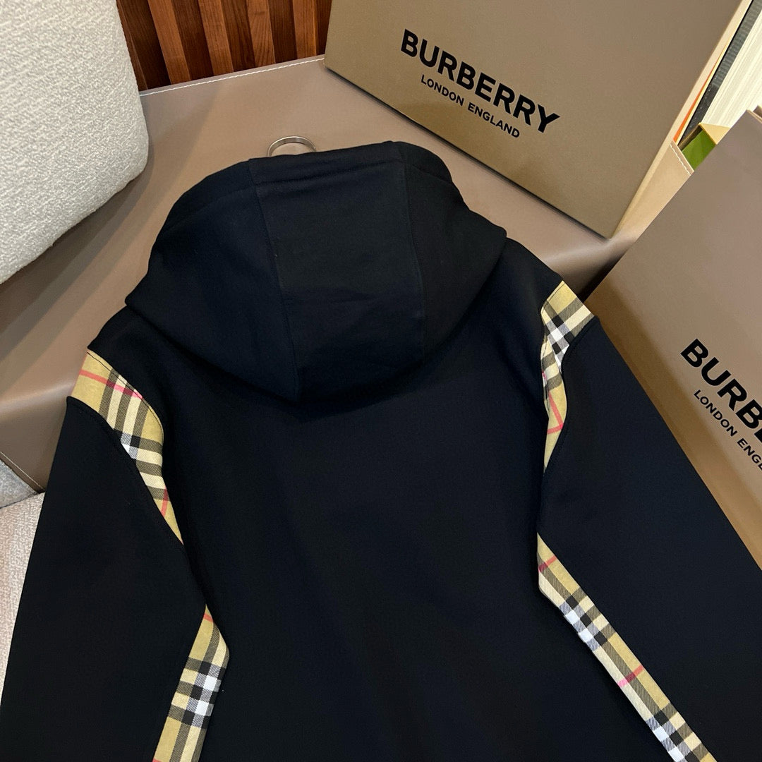 Schwarze und graue Jacke