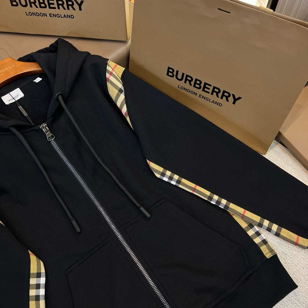Schwarze und graue Jacke