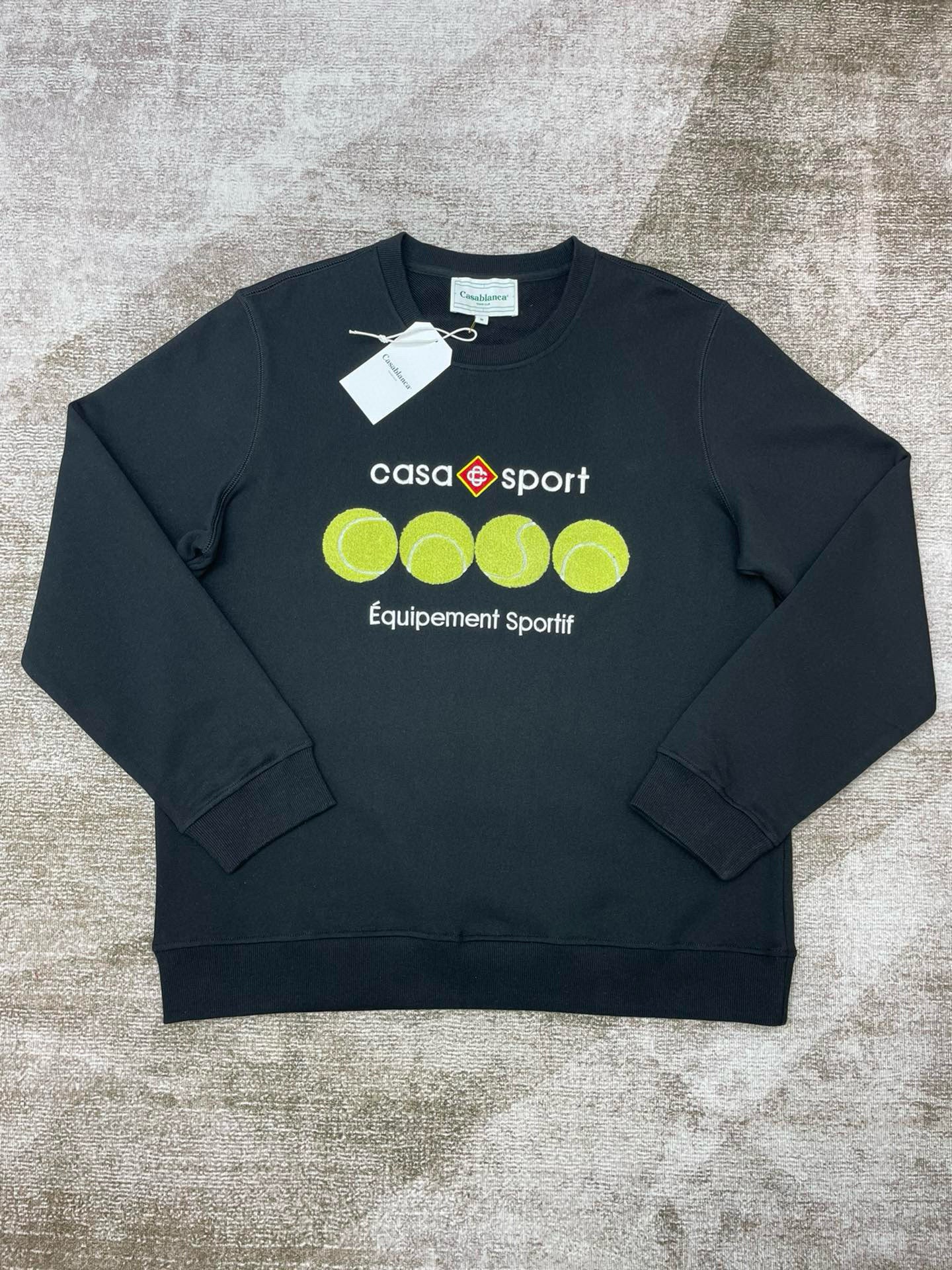 Grünes und schwarzes Sweatshirt