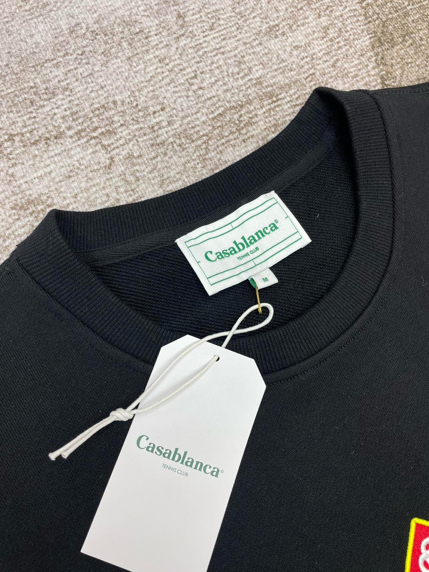 Grünes und schwarzes Sweatshirt