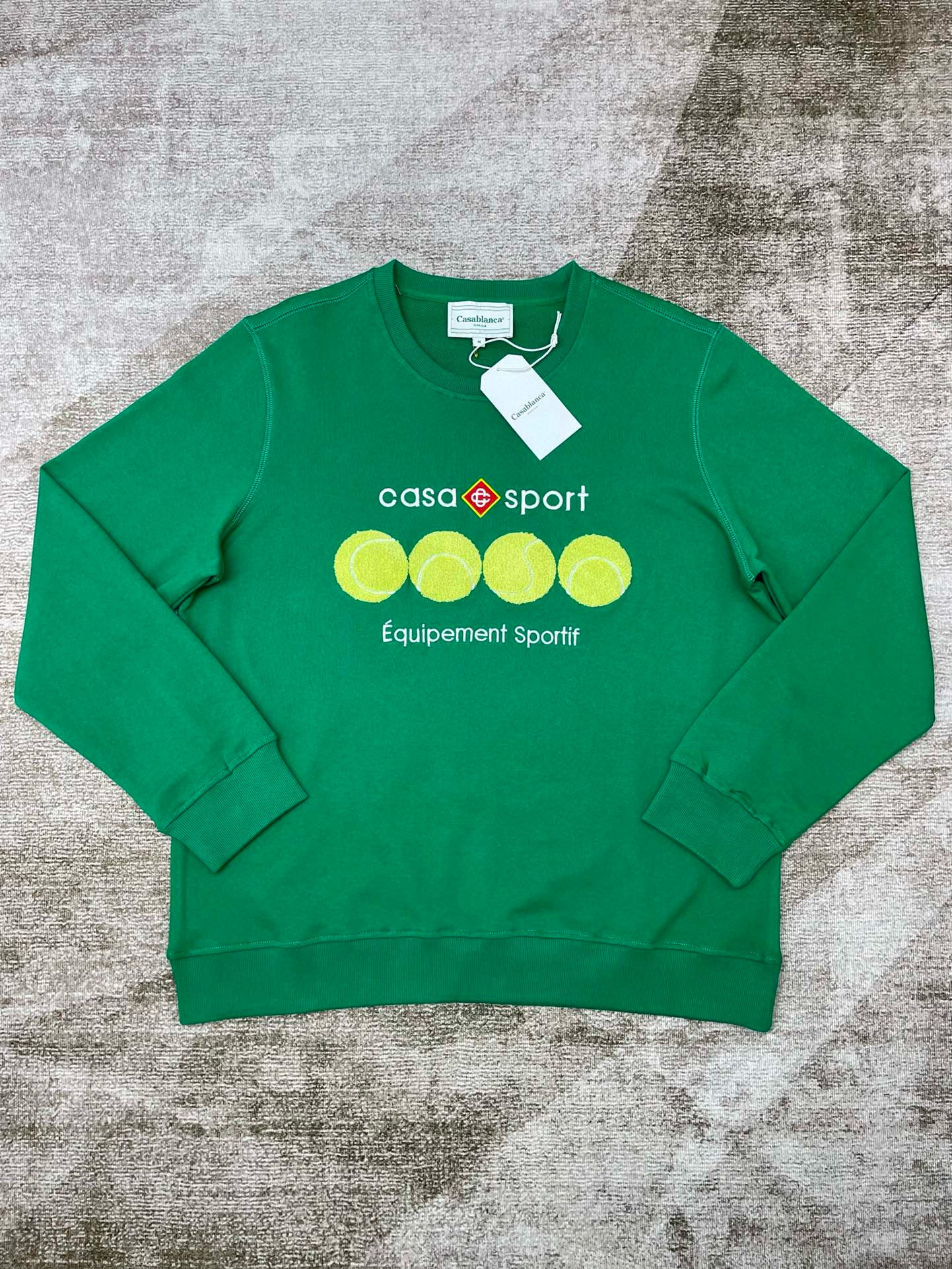 Grünes und schwarzes Sweatshirt