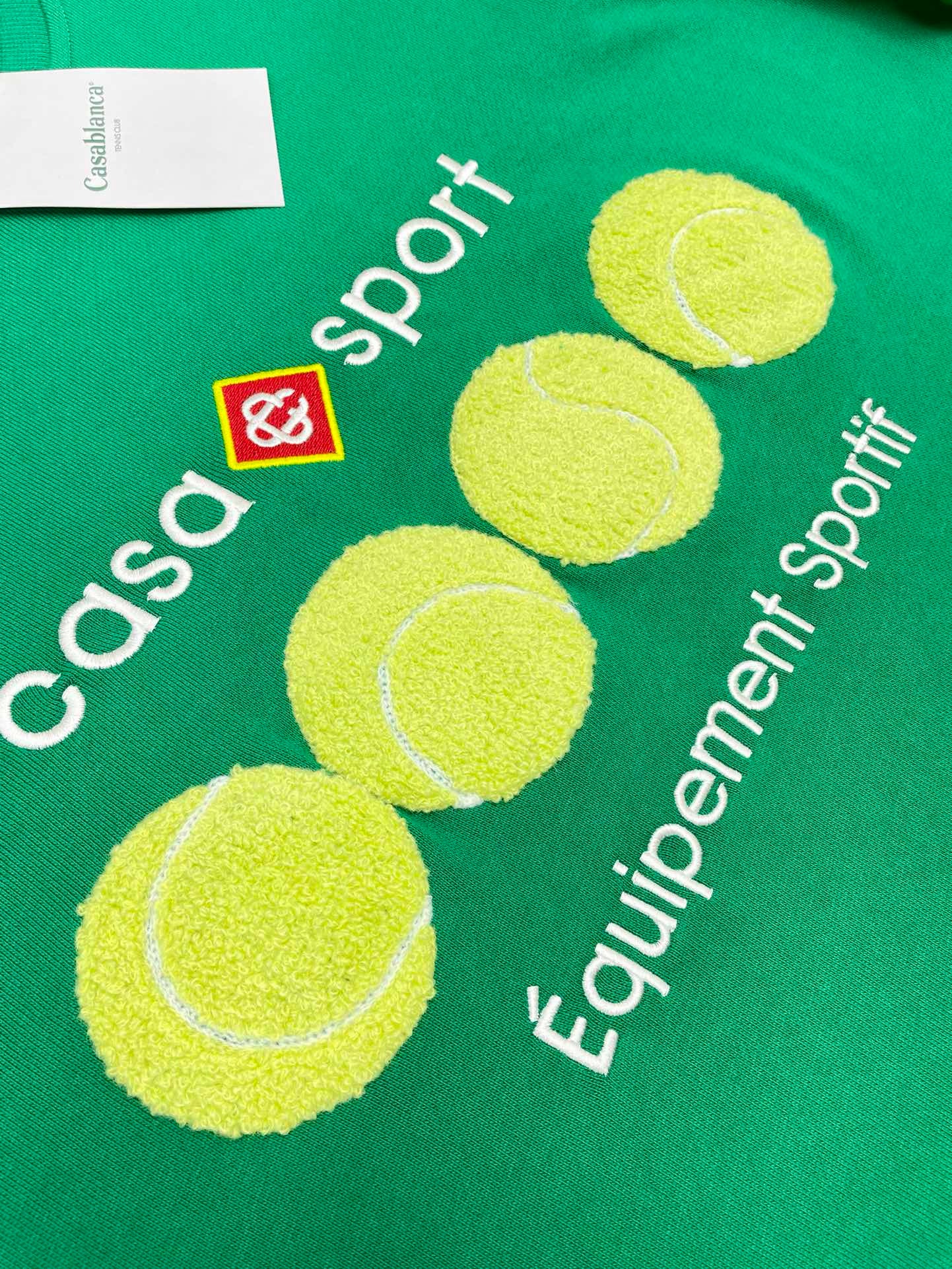 Grünes und schwarzes Sweatshirt