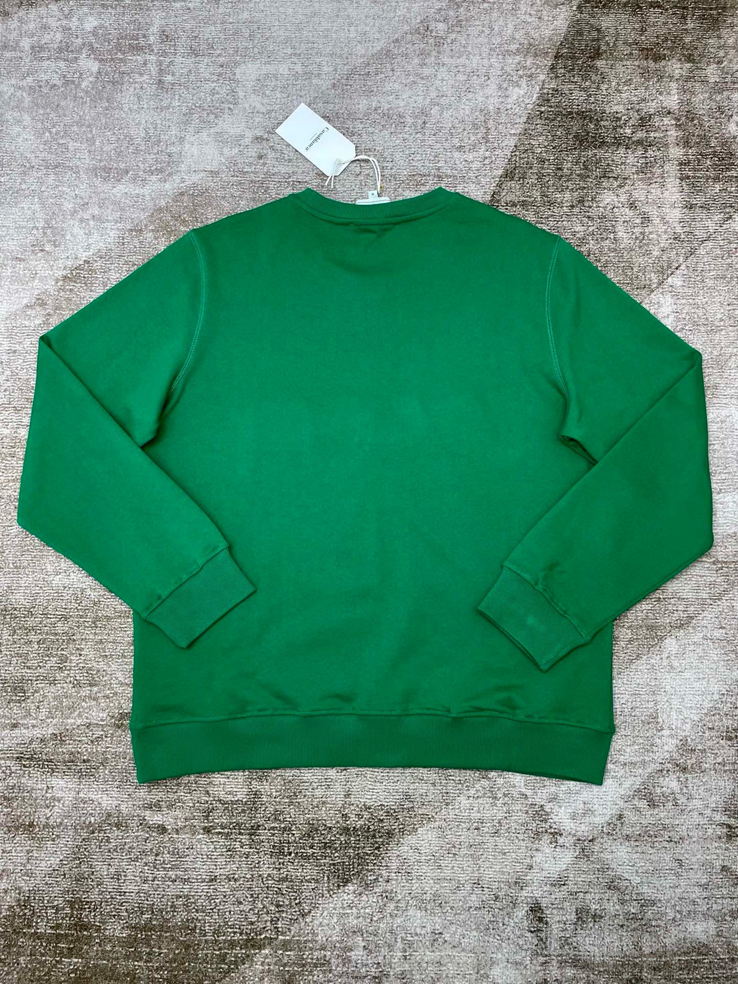 Grünes und schwarzes Sweatshirt