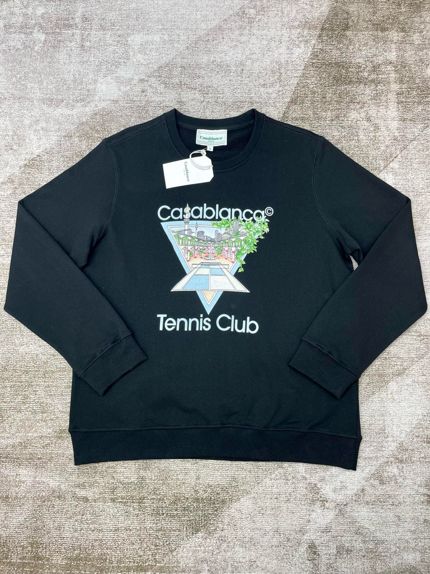 Schwarzes und hellrosa Sweatshirt