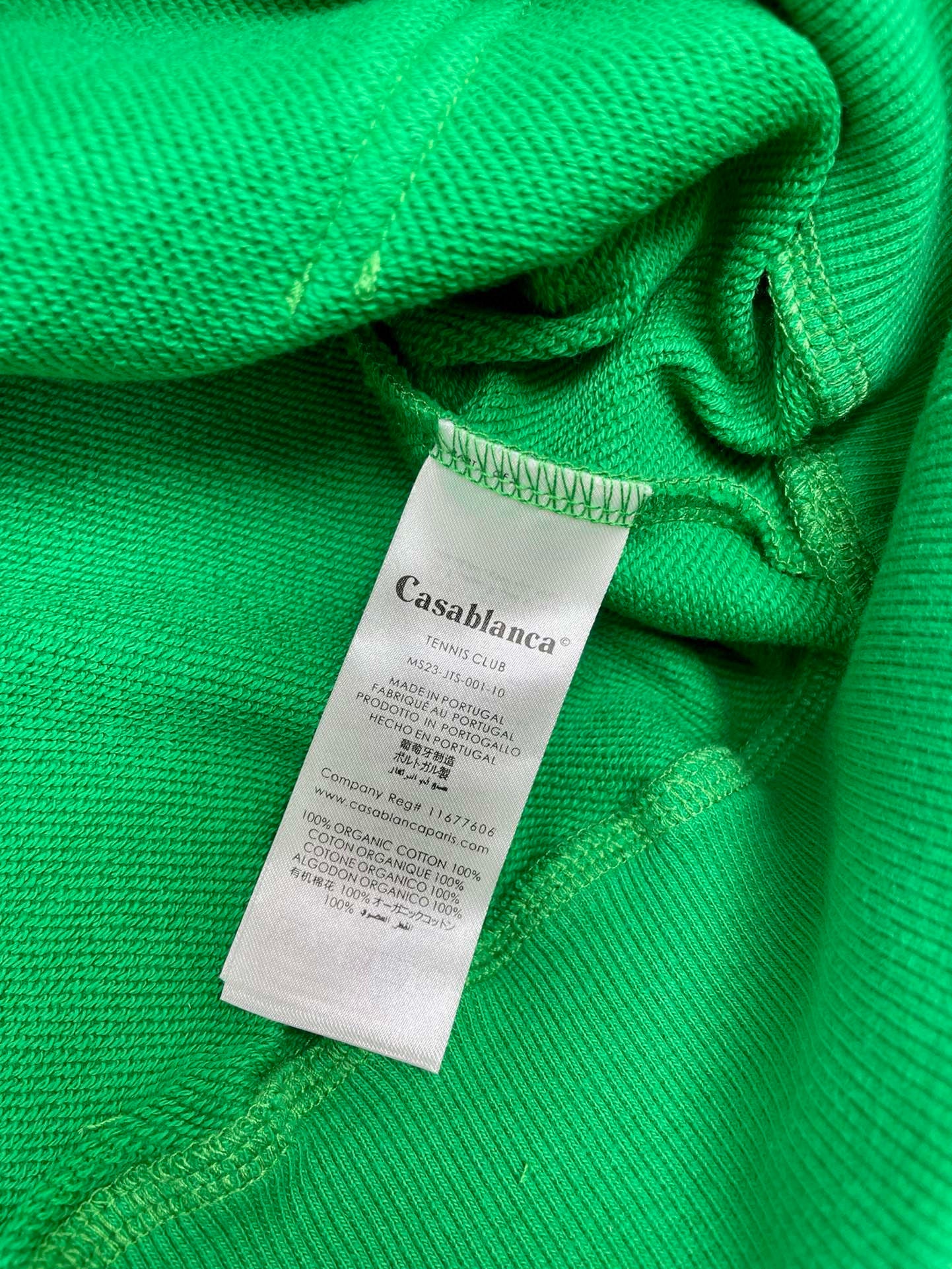 Grüner und schwarzer Kapuzenpullover