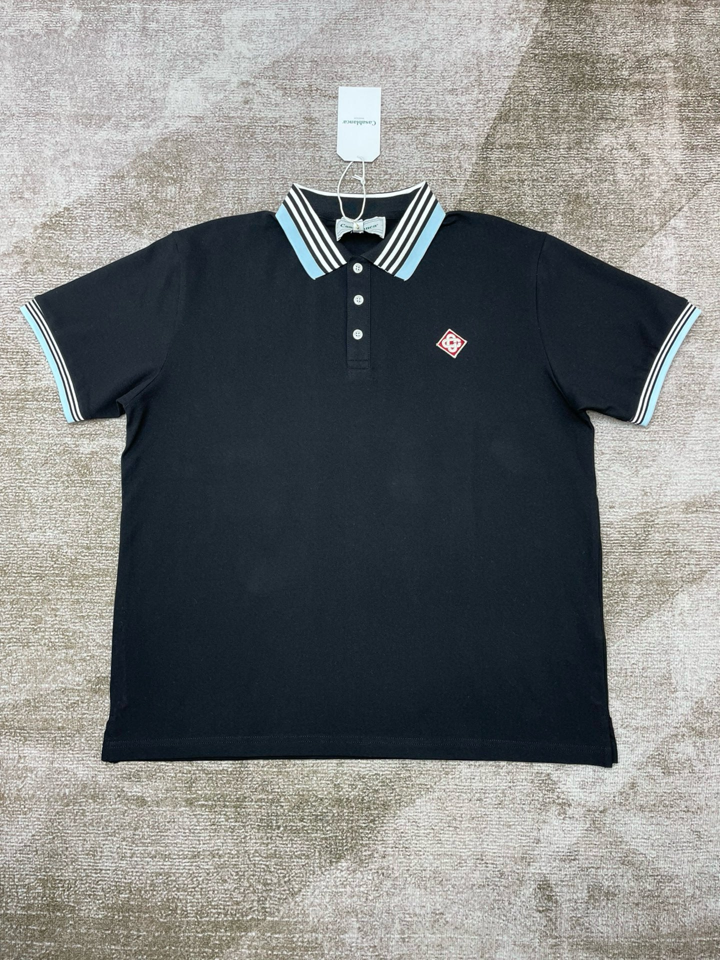 Gelbes und schwarzes Polo