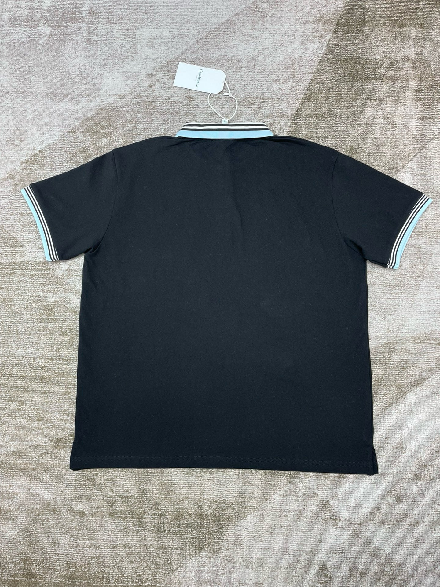 Gelbes und schwarzes Polo