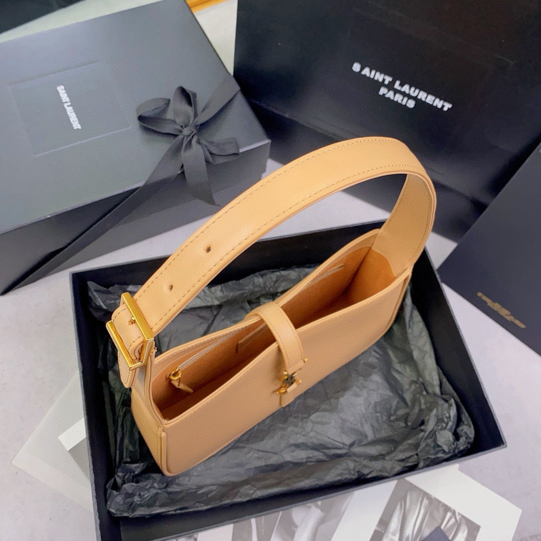 Braune und hellorange Tasche