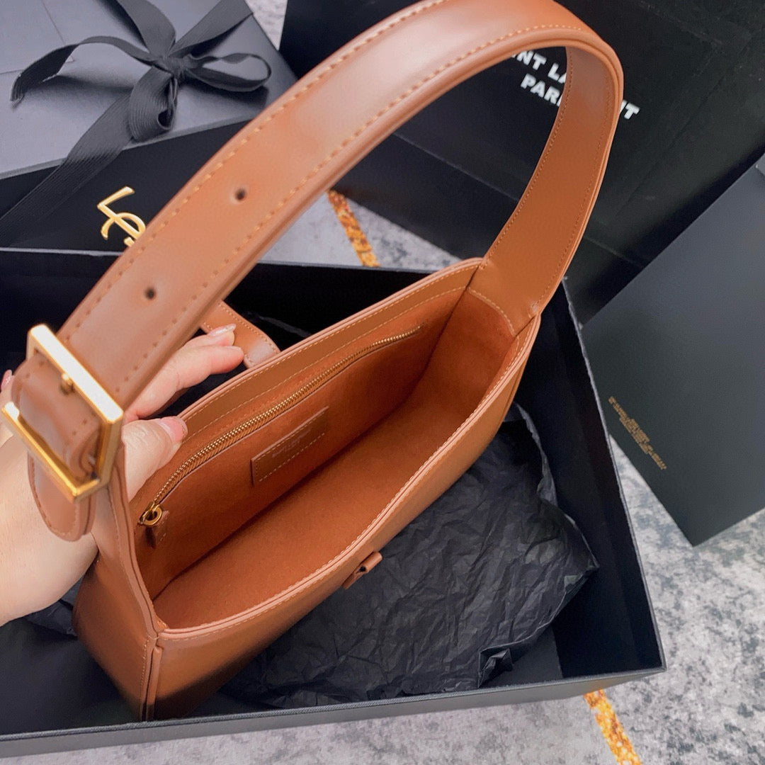 Braune und hellorange Tasche