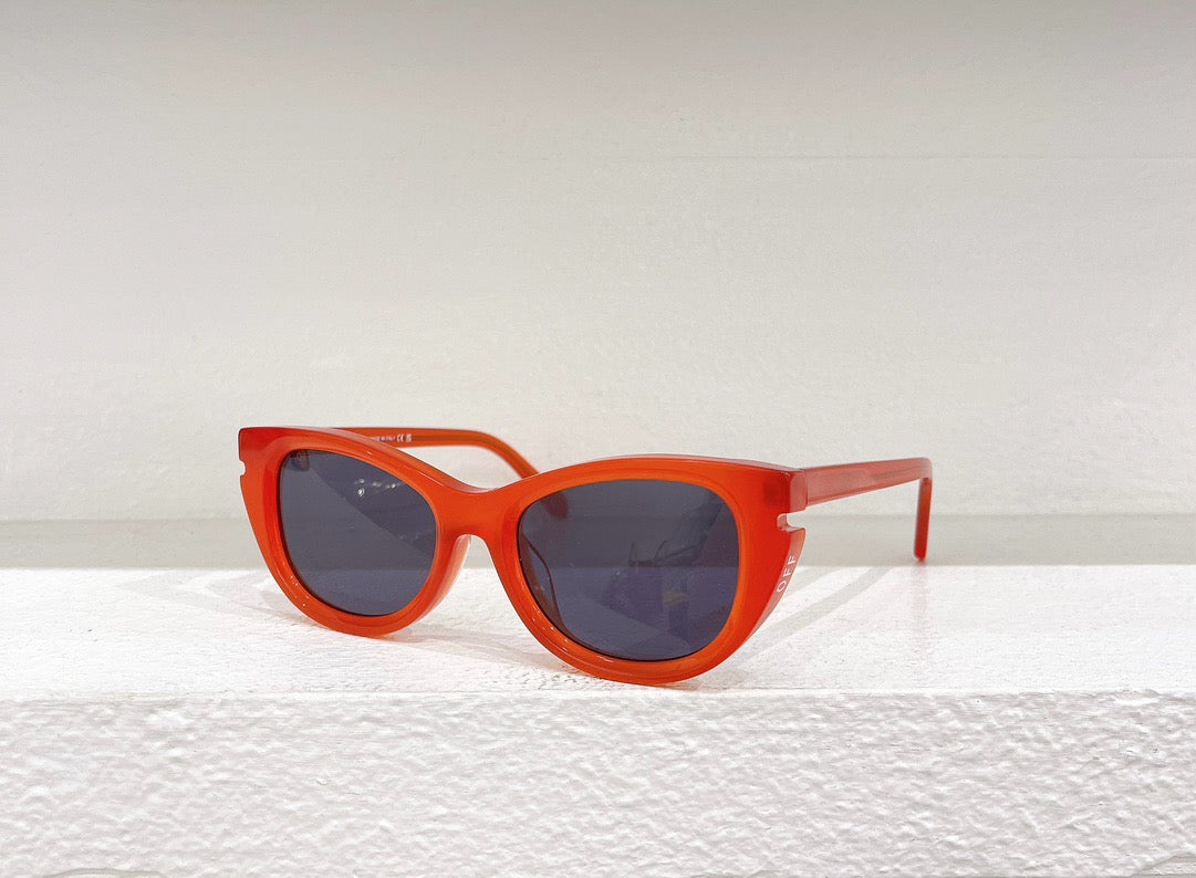 Blaue, rote, weiße und schwarze Sonnenbrille