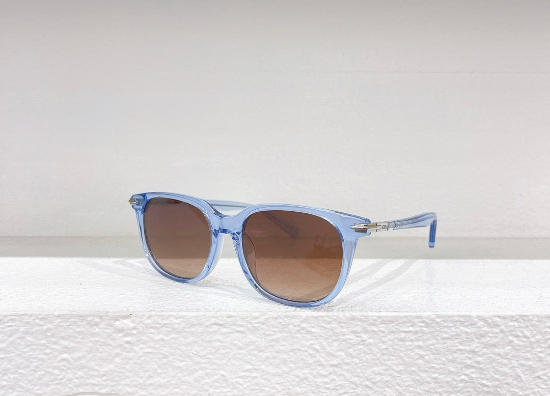 Schwarze, braune und weiße Sonnenbrille
