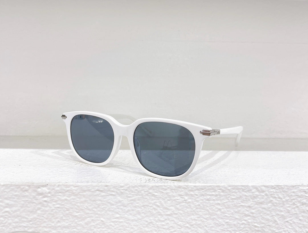 Schwarze, braune und weiße Sonnenbrille