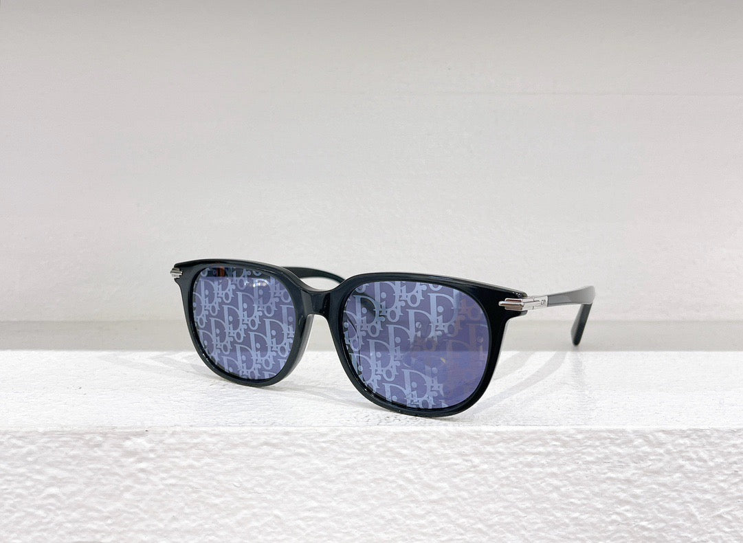 Schwarze, braune und weiße Sonnenbrille