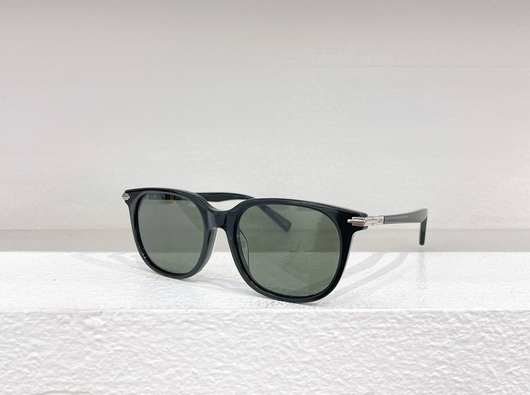 Schwarze, braune und weiße Sonnenbrille