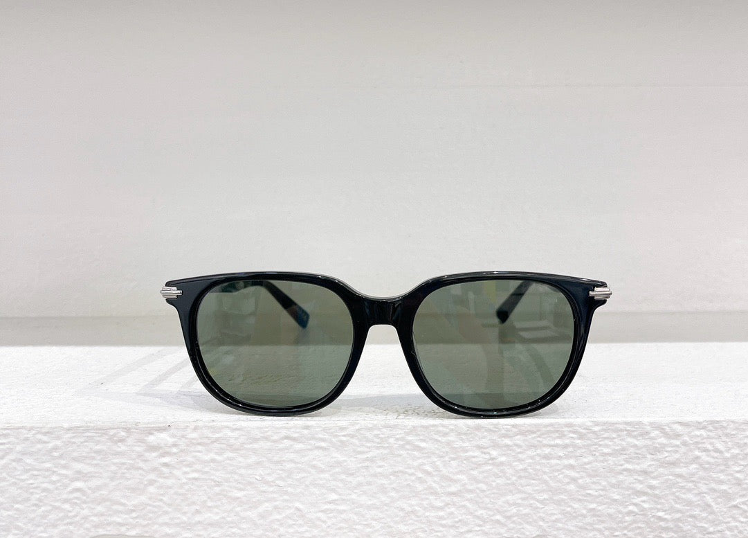 Schwarze, braune und weiße Sonnenbrille