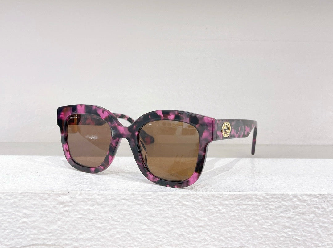 Schwarze, braune und blaue Sonnenbrille