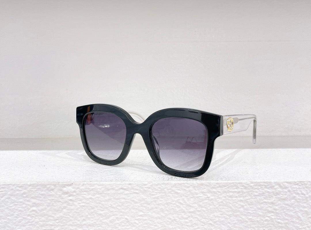 Schwarze, braune und blaue Sonnenbrille