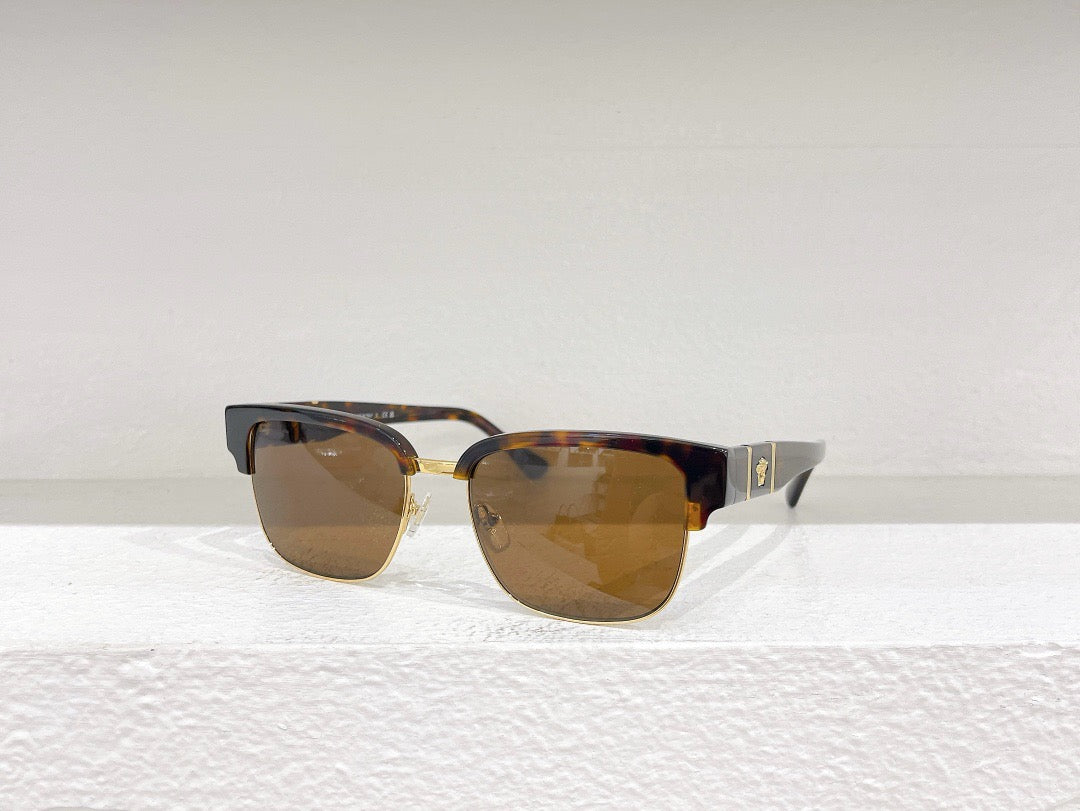 Schwarze, braune und blaue Sonnenbrille
