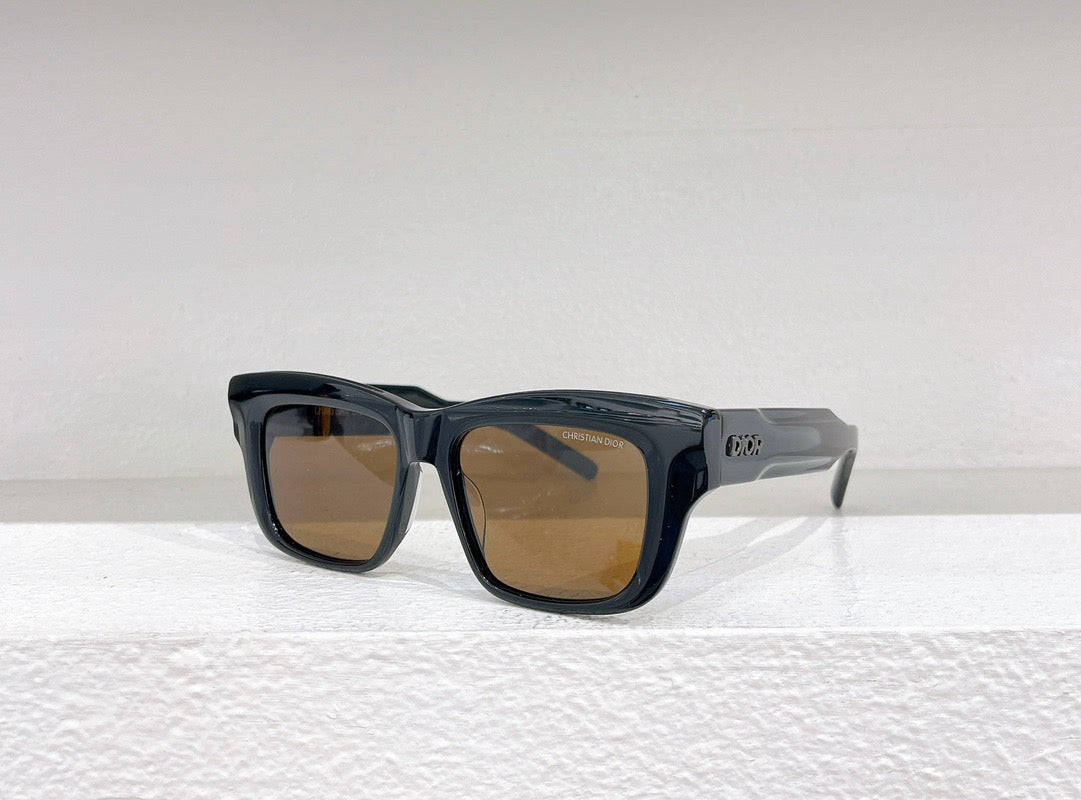 Schwarze, blaue, grüne und weiße Sonnenbrille