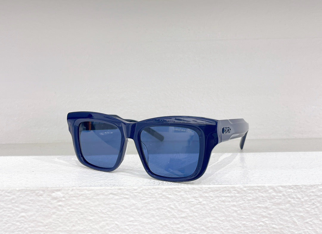 Schwarze, blaue, grüne und weiße Sonnenbrille