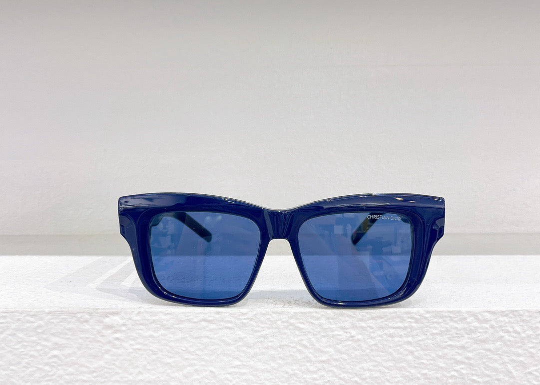 Schwarze, blaue, grüne und weiße Sonnenbrille