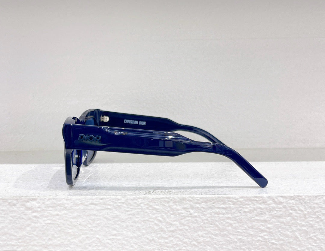 Schwarze, blaue, grüne und weiße Sonnenbrille