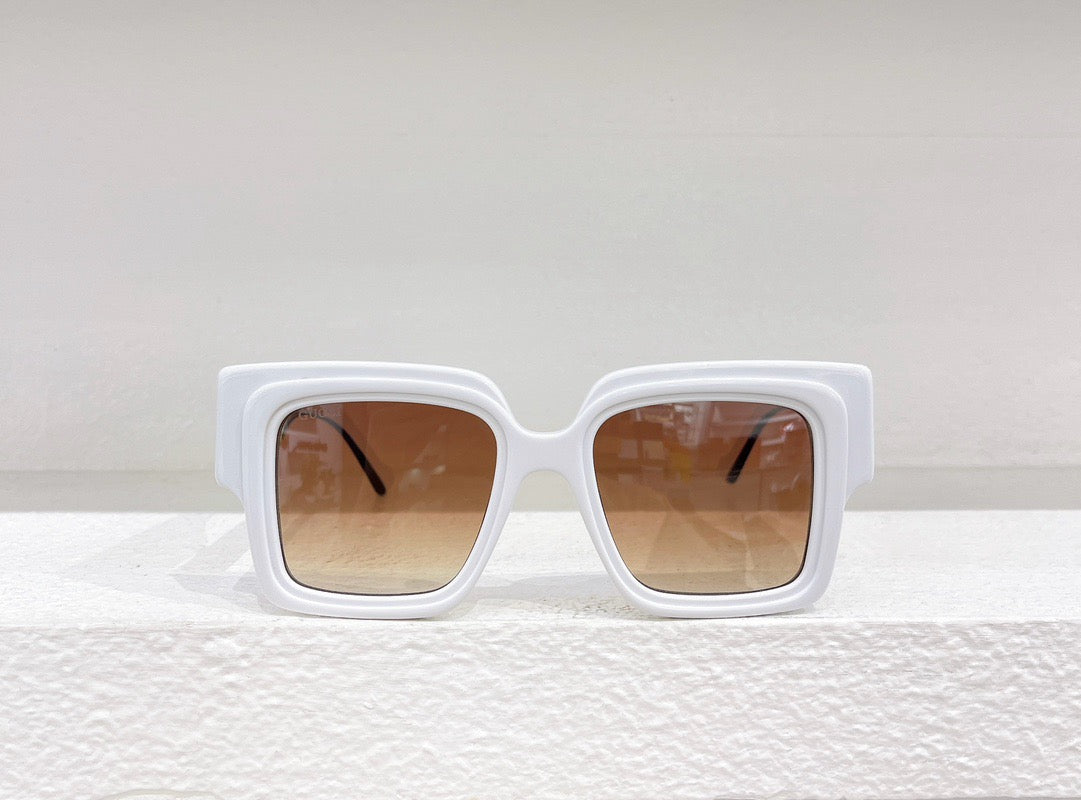 Gafas de sol negras, rojas y blancas