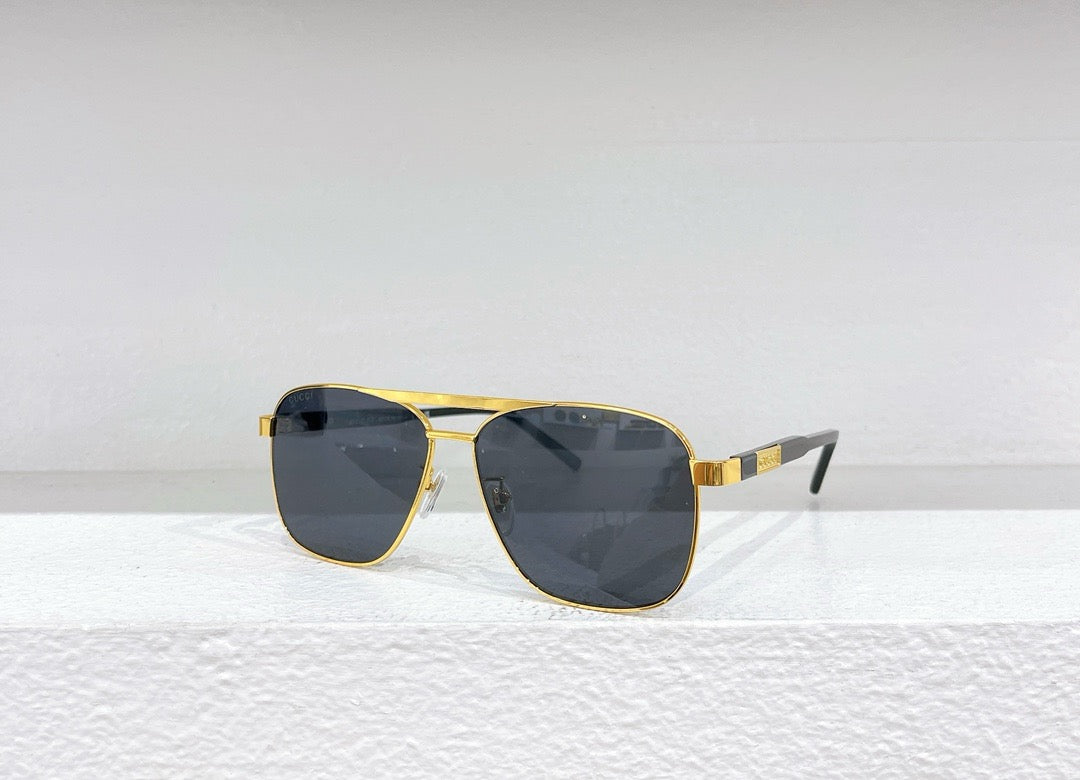 Schwarze, braune und grüne Sonnenbrille