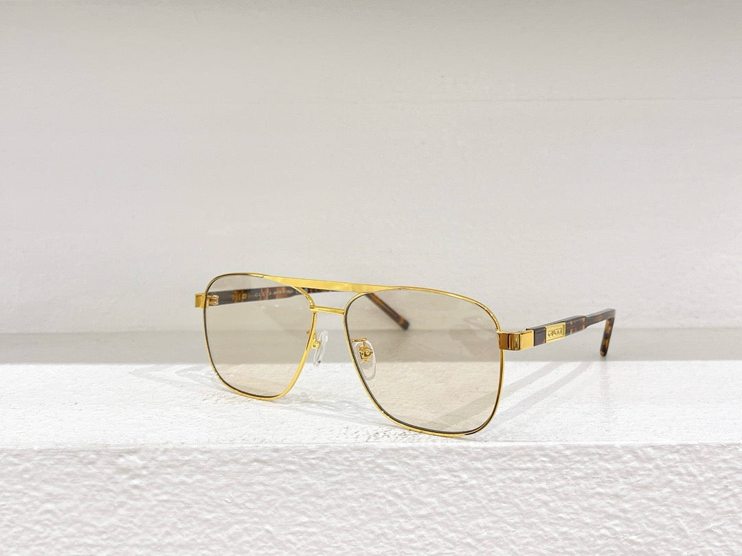 Schwarze, braune und grüne Sonnenbrille