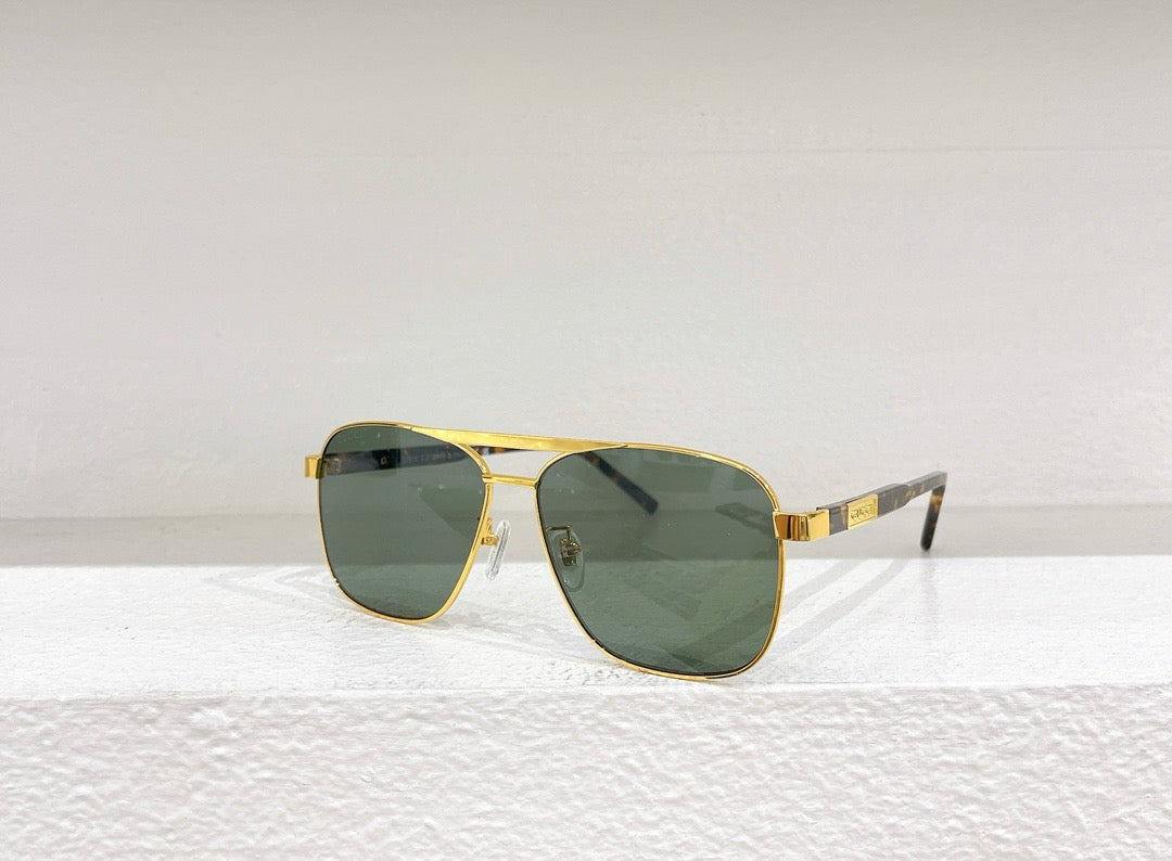 Schwarze, braune und grüne Sonnenbrille