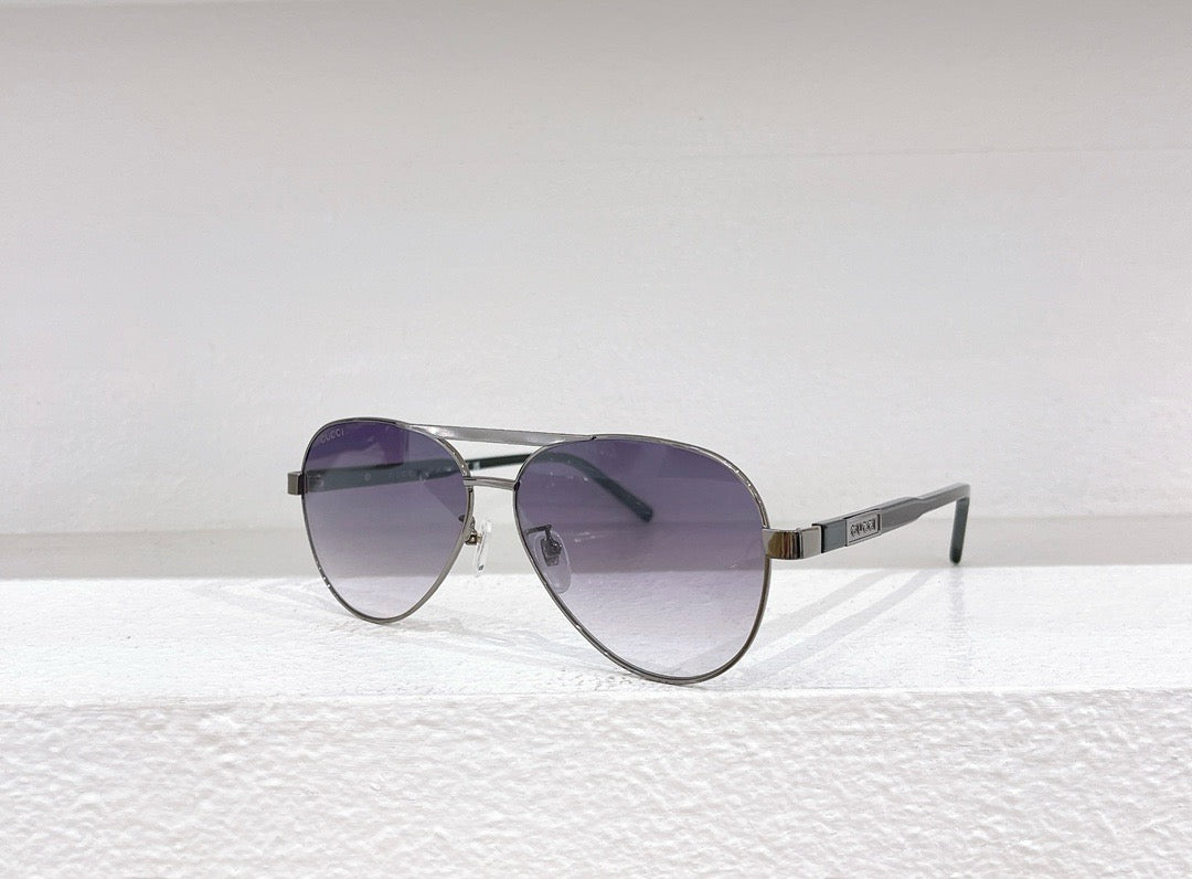 Schwarze, braune und blaue Sonnenbrille