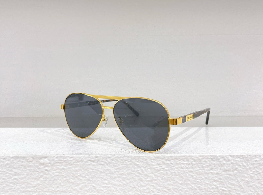 Schwarze, braune und blaue Sonnenbrille