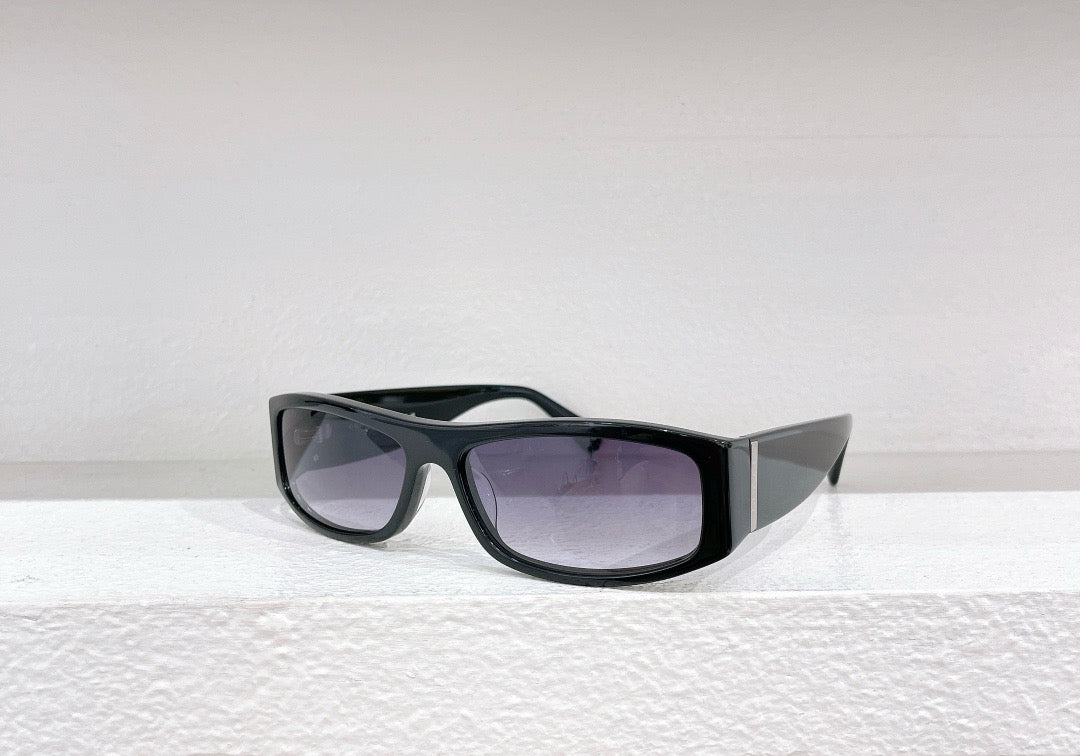Schwarze, braune und blaue Sonnenbrille