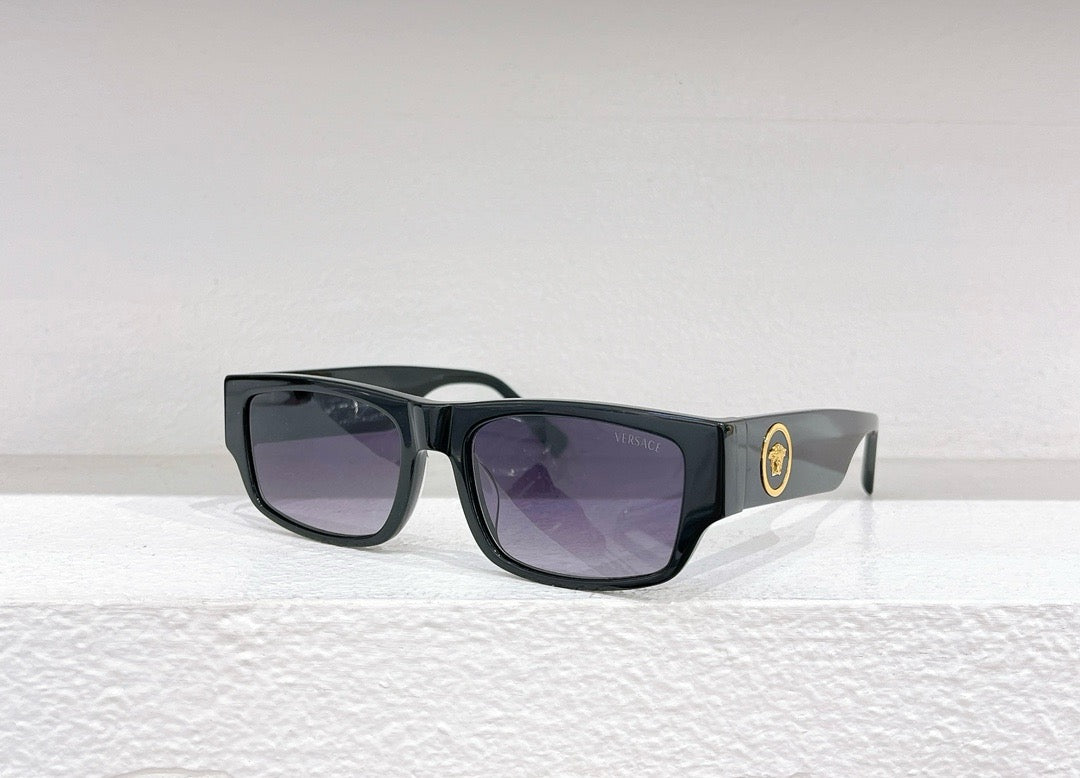Schwarze, braune und graue Sonnenbrille