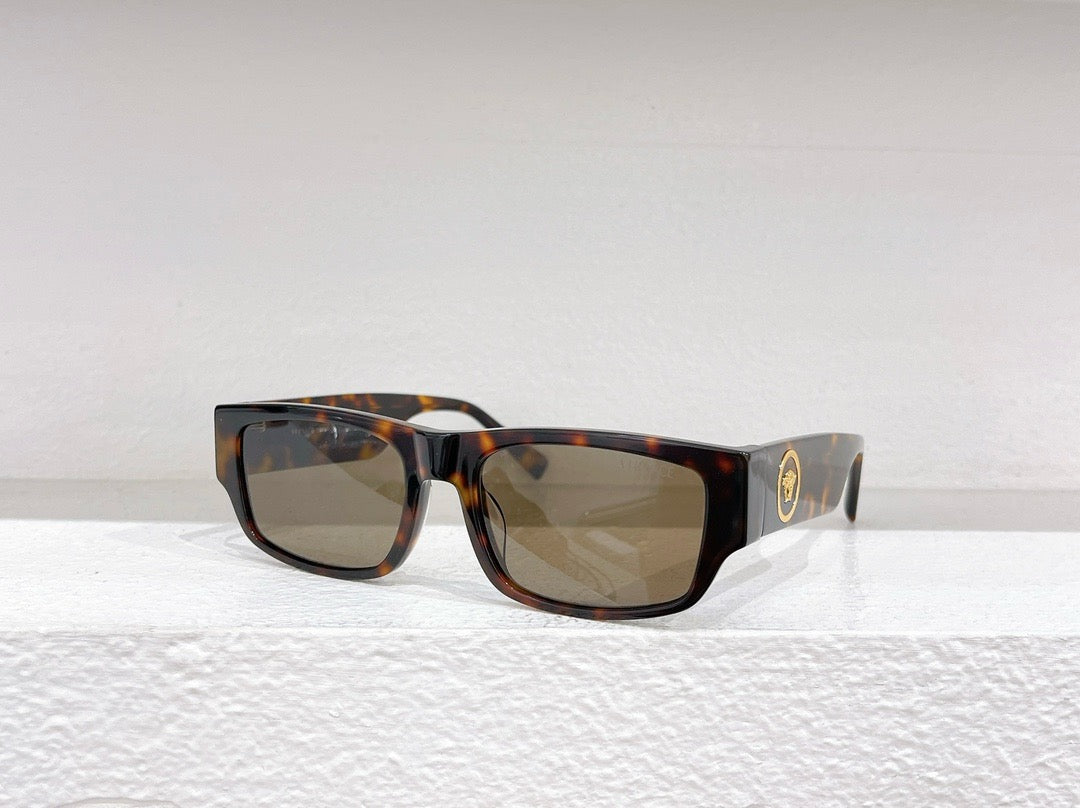 Schwarze, braune und graue Sonnenbrille