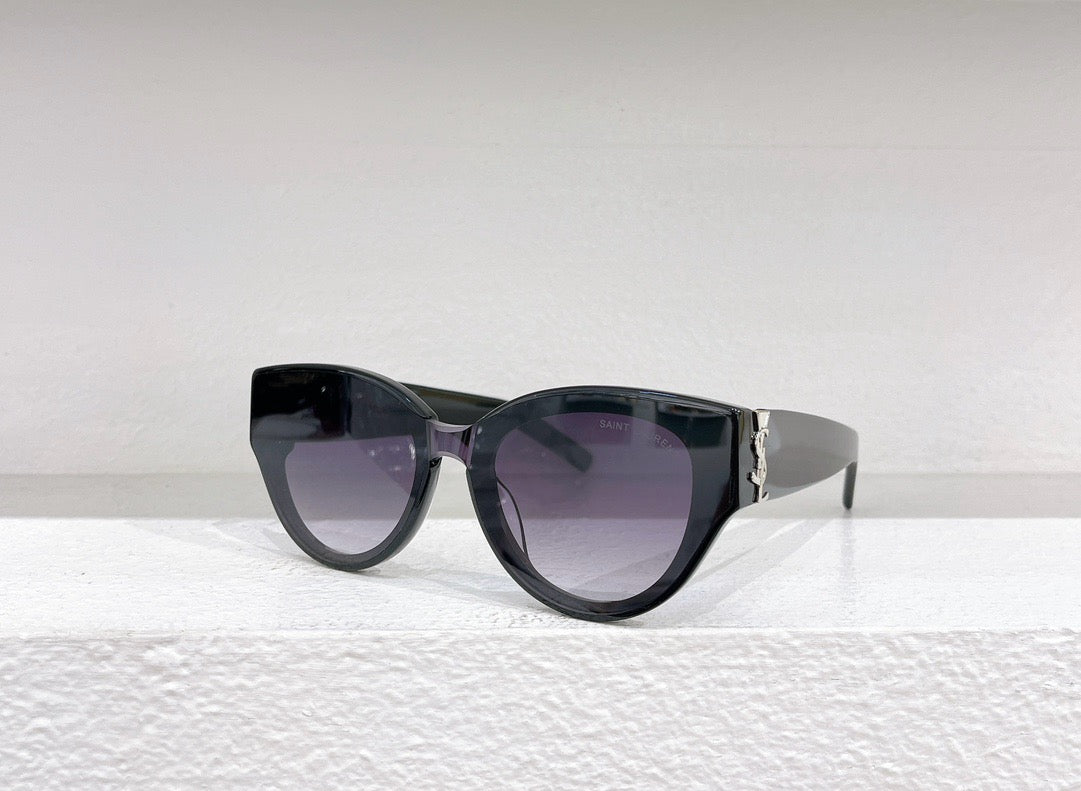 Schwarze, braune, blaue und weiße Sonnenbrille