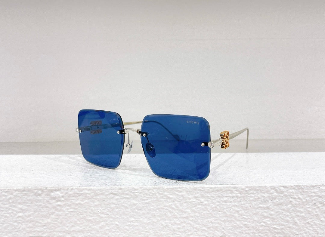 Blaue, braune, schwarze und rosa Sonnenbrille