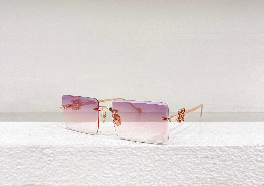 Blaue, braune, schwarze und rosa Sonnenbrille